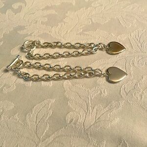 Two identical silver plated chain bracelets